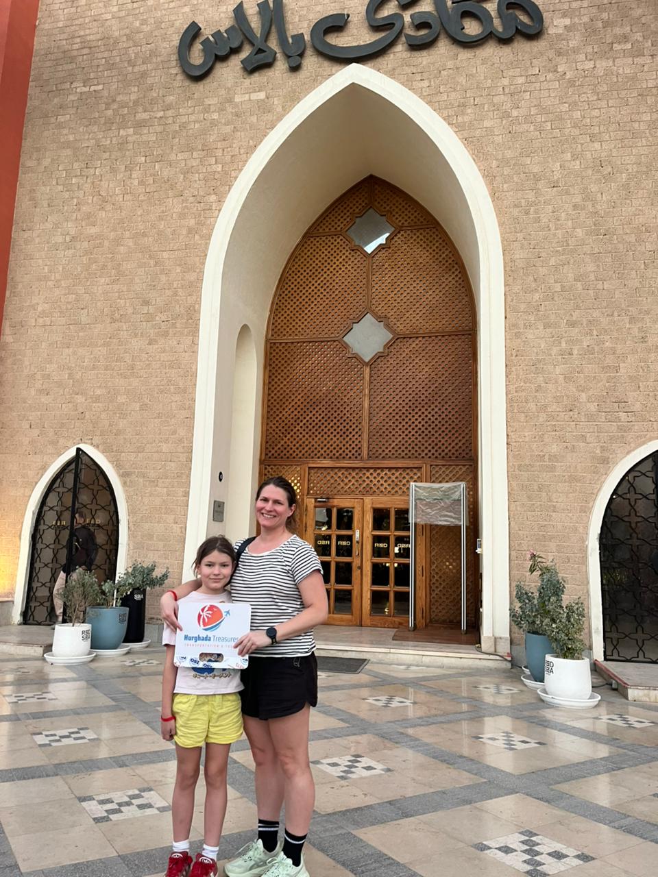 Mother and daughter with the Hurghada Treasures sign at Makadi Palace