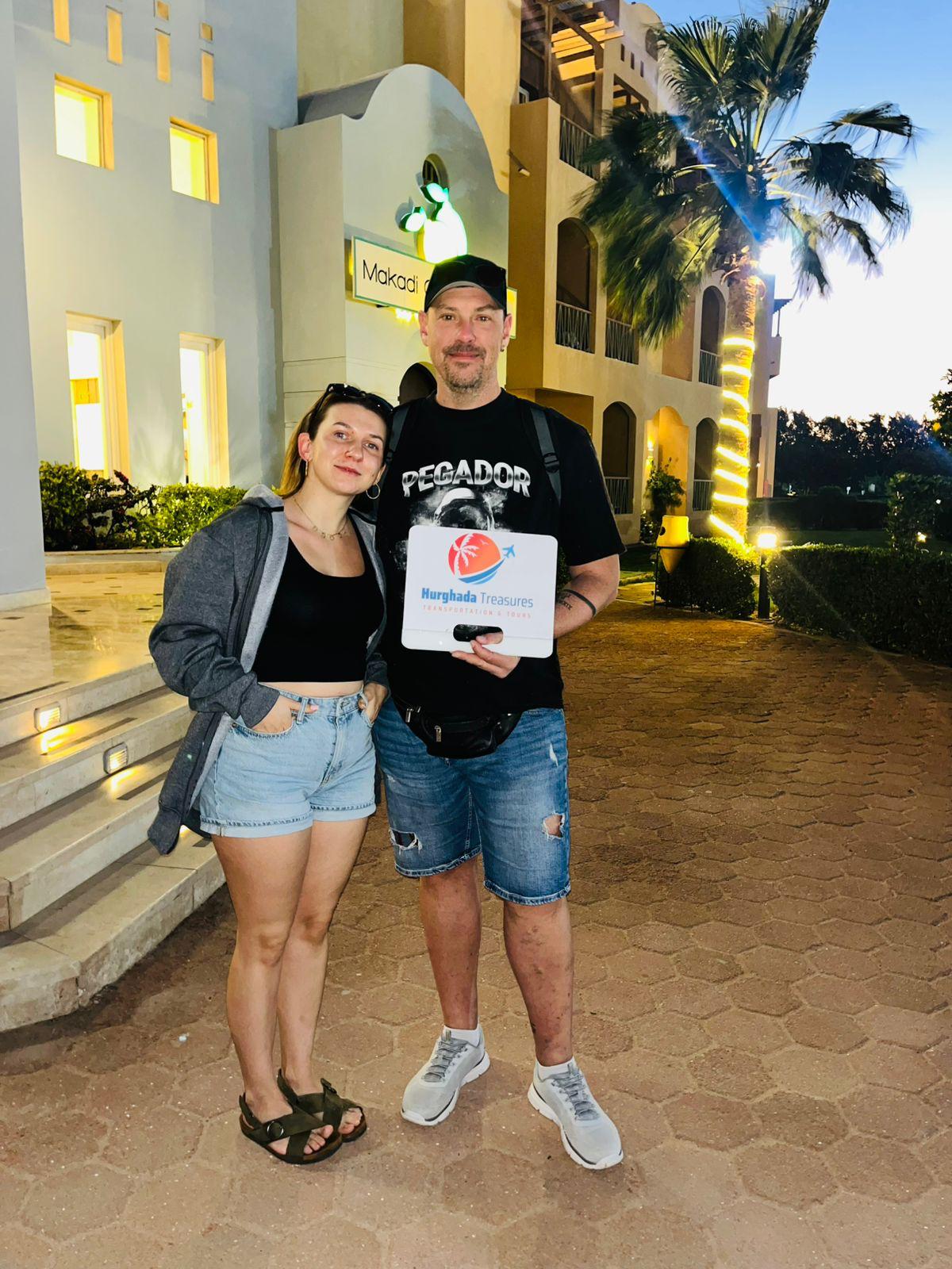 Couple at Makadi Garden Hotel entrance after a private Hurghada transfer